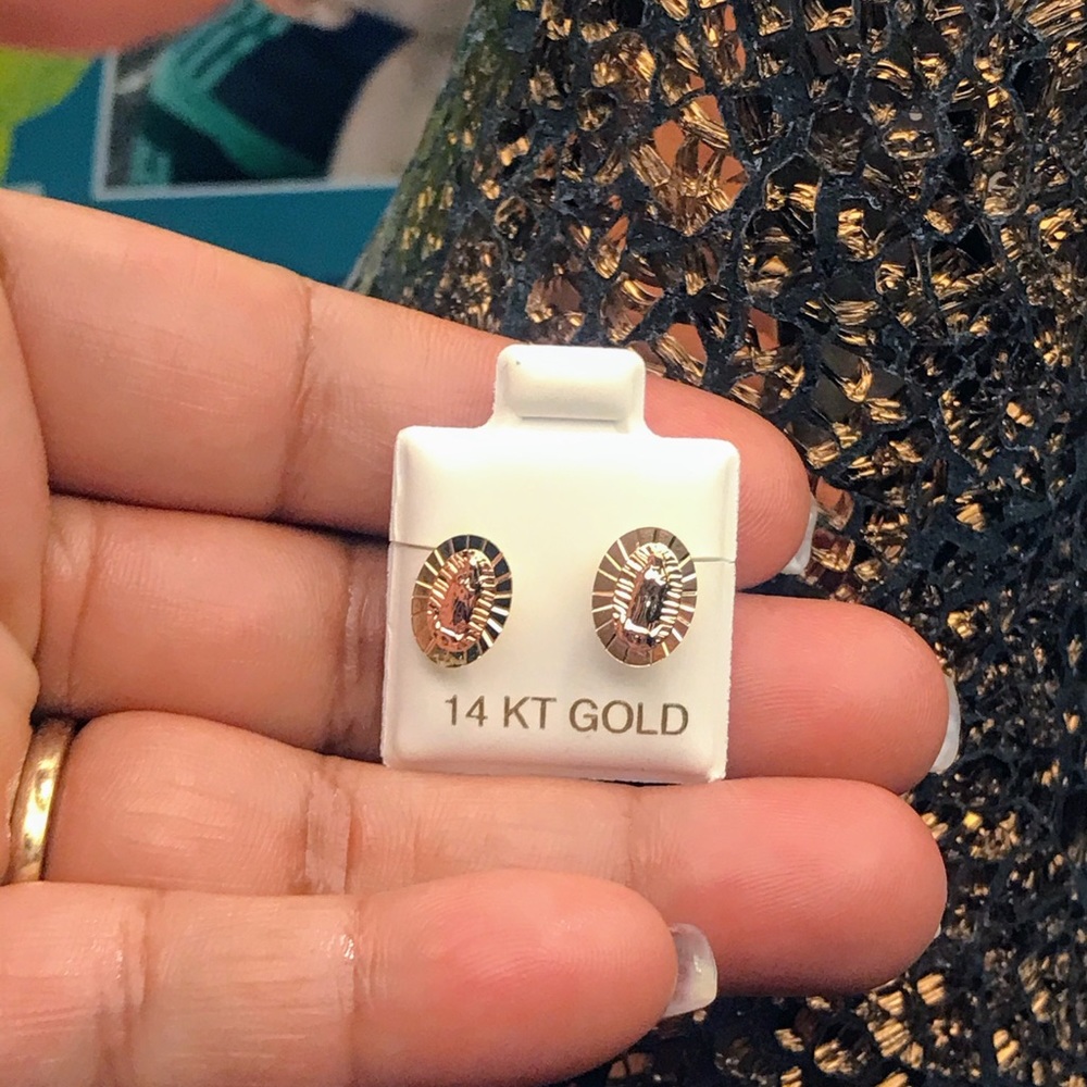 14k Virgin Mary stud earrings made in yellow gold.
